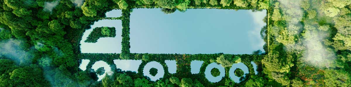 A cut out image of a truck in a green forest representing the importance of green logistics